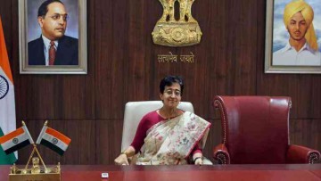 Grave insult': Atishi's 'Bharat'-like gesture with CM chair for Kejriwal angers Congress, BJP
